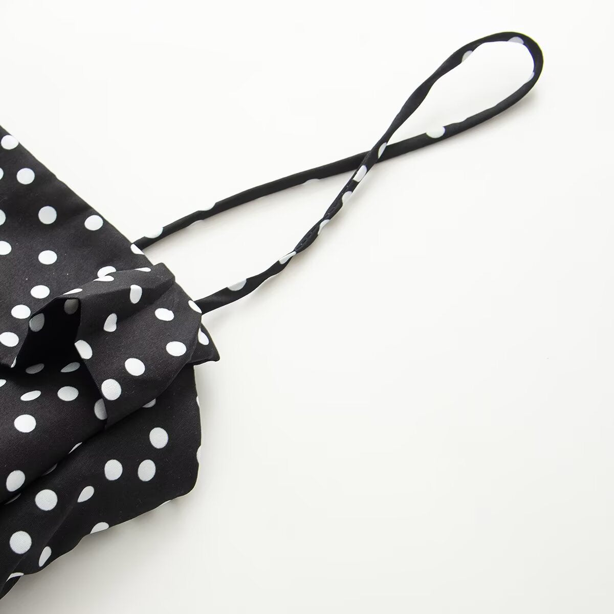 Sleeveless polka dot mini layered camisole dress