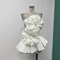 Skincare top design, niche female heavy worker, pleated three-dimensional flower slimming, irregular lotus leaf arrangement, vacation shirt trend